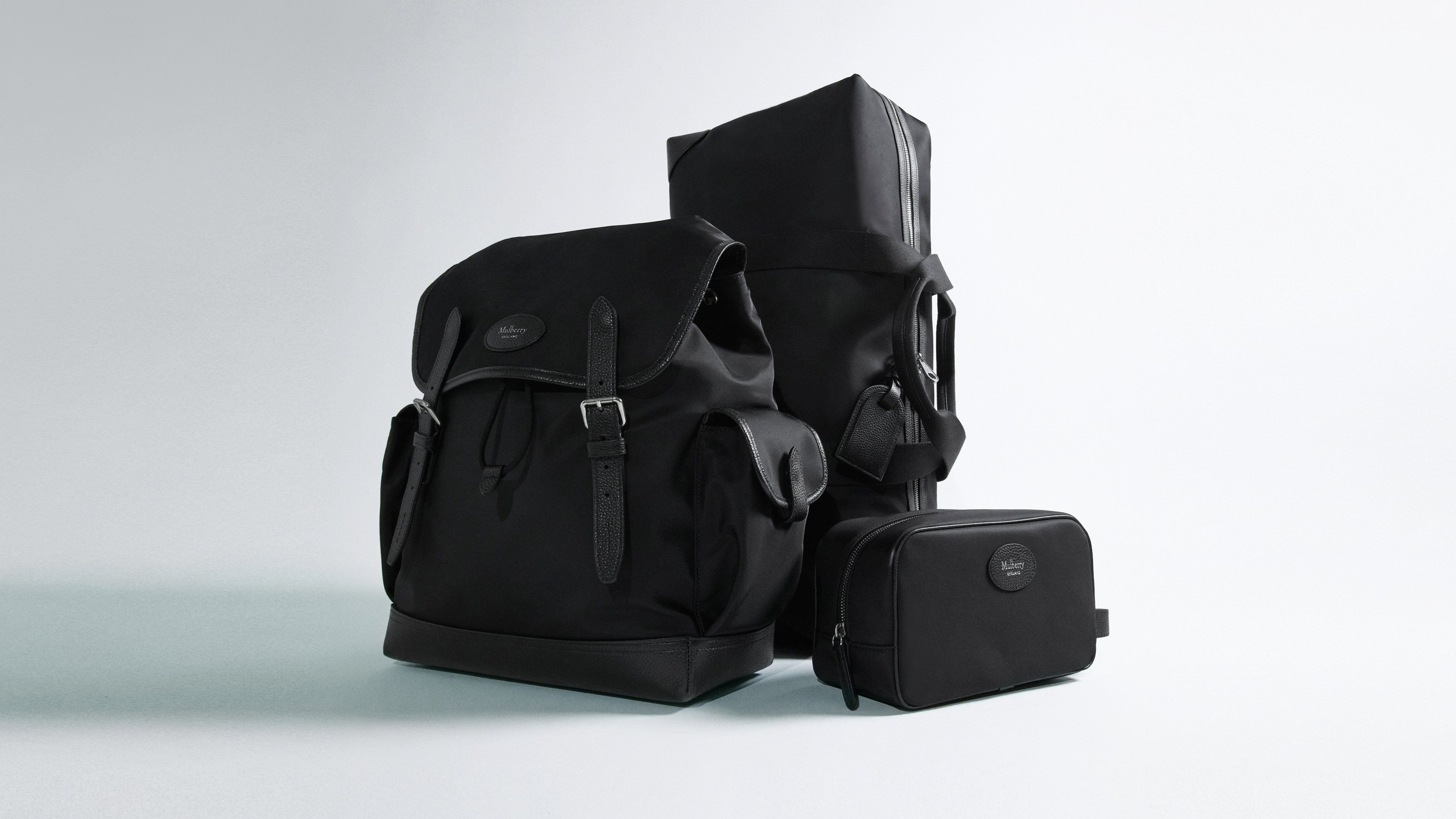 Group of Mulberry Nylon Heritage backpack, nylon clipper and nylon wash case in black